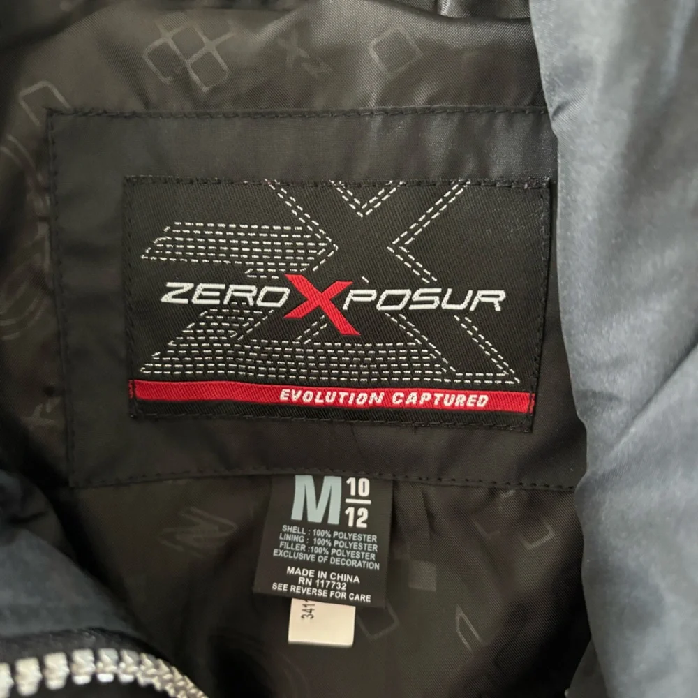ZEROXPOSUR. Super cute girls puffer vest with a‎ little bling.
